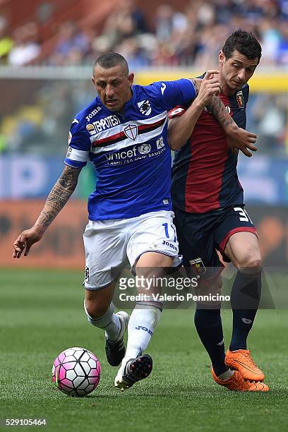 Blerim Dzemaili of Genoa CFC is challenged by Angelo Palombo of UC Sampdoria during the Serie A match between UC Sampdoria and Genoa CFC at Stadio...