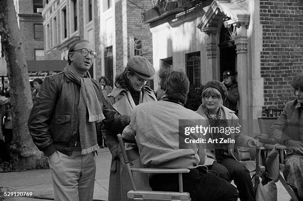Marsha Mason and Neil Simon, standing behind Beverly D'Angelo on a set; circa 1970; New York.