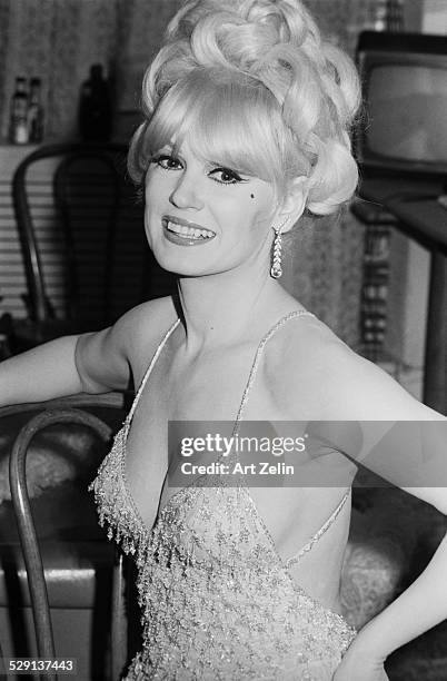 Mamie Van Doren, close-up in beaded gown; circa 1970; New York.