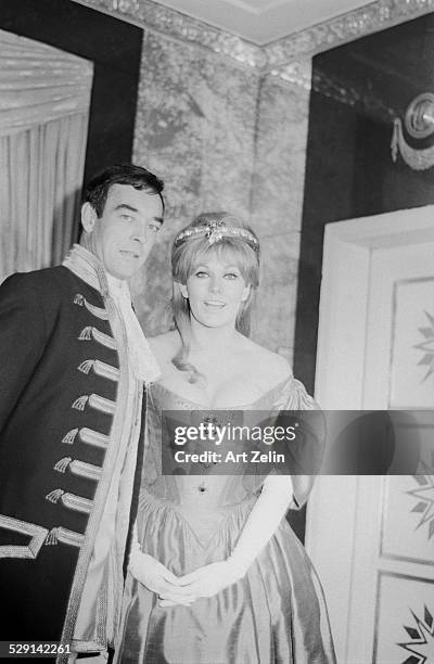 Kim Novak and Richard Johnson, her husband, in costume for the Moll Flanders Ball; circa 1970; New York.