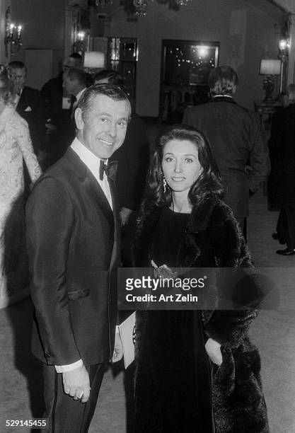 Johnny Carson with his wife Joanna Holland at a formal event; circa 1970; New York.