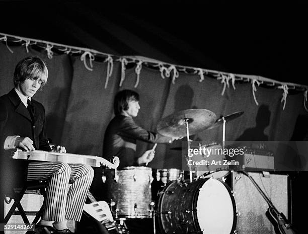 Charlie Watts and Brian Jones of the Rolling Stones in performance; circa 1965; New York.