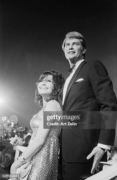 Troy Donahue with his wife Valerie arriving at an event; circa 1970; New York.