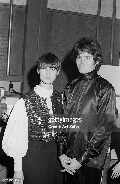 Micky Dolenz of the Monkees with a friend; circa 1970; New York.