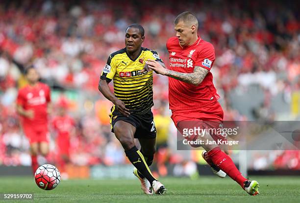 Odion Ighalo of Watford battles for the ball with Cameron Brannagan of Liverpool during the Barclays Premier League match between Liverpool and...