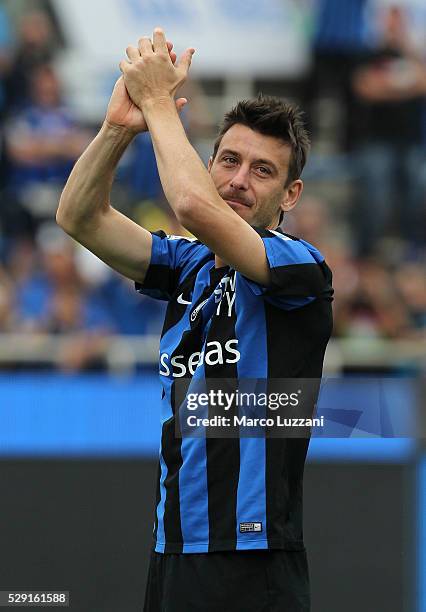 Gianpaolo Bellini of Atalanta BC salutes the fans for its last game of his career in Bergamo at the end of the Serie A match between Atalanta BC and...