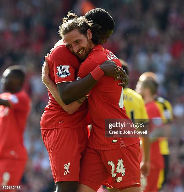 Joe Allen celebrates of Liverpool his goal with Sheyi Ojo of Liverpool during the Barclays Premier League match between Liverpool and Watford at...