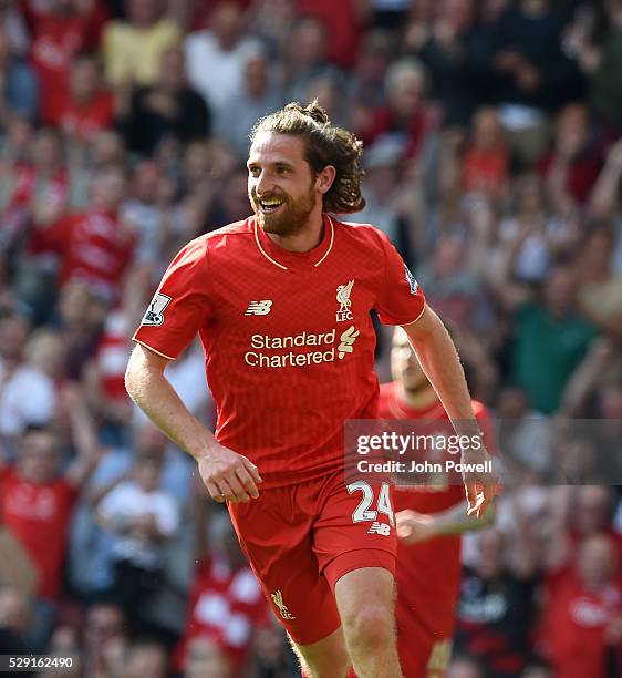 Joe Allen of Liverpool celebrates his goal during the Barclays Premier League match between Liverpool and Watford at Anfield on May 08, 2016 in...