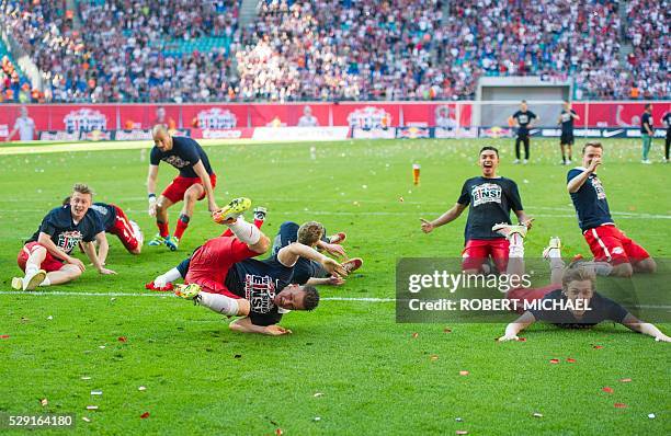 Leipzig��s players celebrate after the German second division Bundesliga football match between RB Leipzig and Karlsruher SC at the Red Bull Arena in...