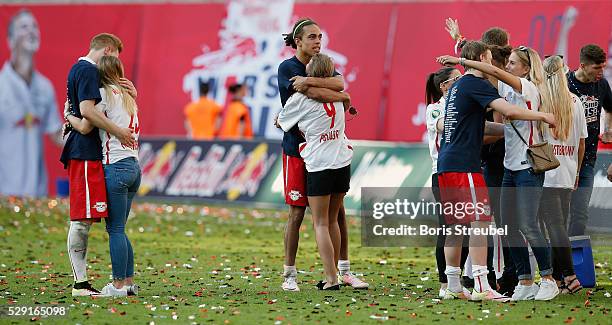 The players of Leipzig and their girl-friends celebrate promotion to the first Bundesliga after winning the Second Bundesliga match between RB...