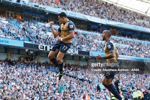 Alexis Sanchez of Arsenal celebrates after scoring a goal to make it 2-2 during the Barclays Premier League match between Manchester City and Arsenal...