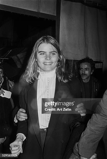 Mariel Hemingway making her way through a crowd.; circa 1970; New York.