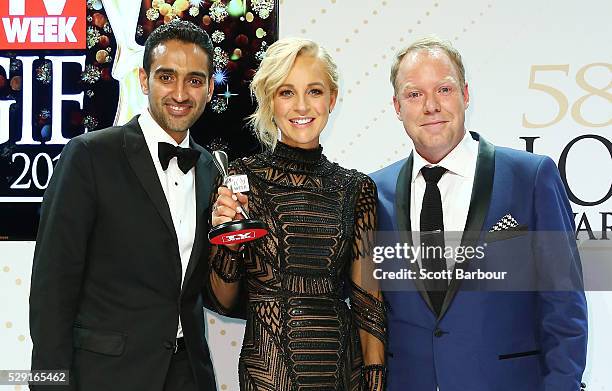 Waleed Aly, Carrie Bickmore and Peter Helliar pose with the Logie Award for Best News Panel Or Current Affairs Program 'The Project ' during the 58th...