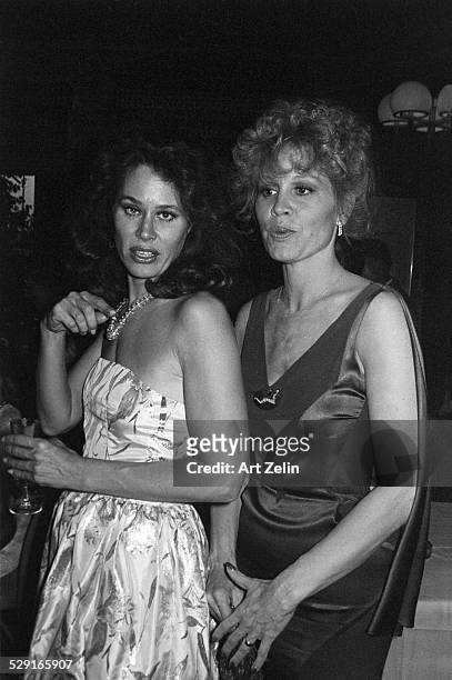 American actresses Karen Black and her sister Gail Brown, at a party, New York, circa 1980.