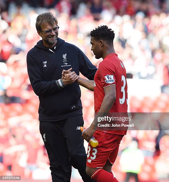 Jurgen Klopp manager of Liverpool shakes hands with Jordon Ibe of Liverpool at the end of the Barclays Premier League match between Liverpool and...