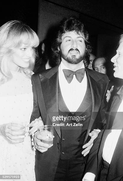 Sylvester Stallone with Susan Anton at a formal event; circa 1970; New York.