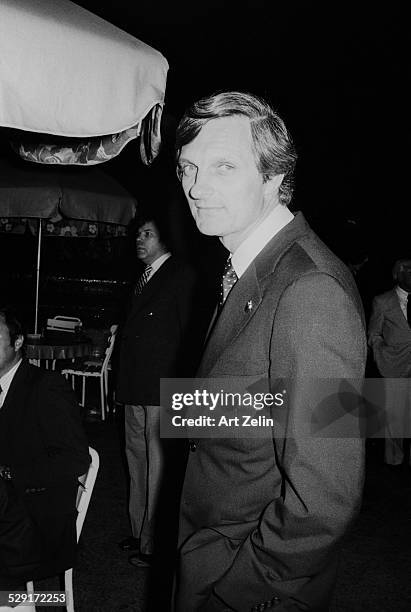 Alan Alda at an outside event; circa 1970; New York.