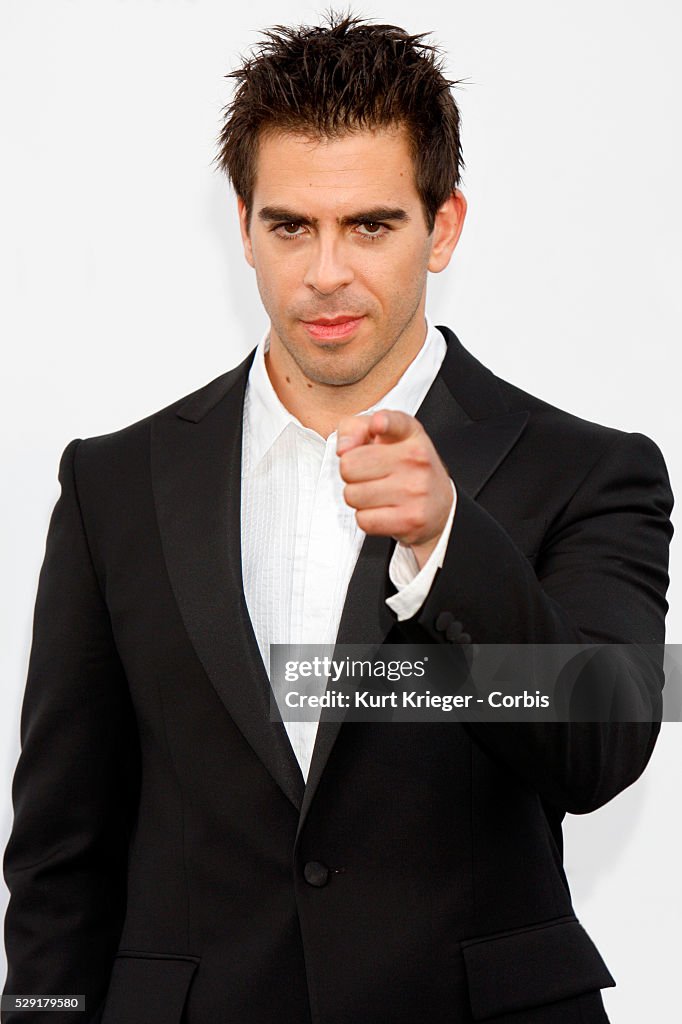 Eli Roth Build Eli Roth arrives at amfARs Cinema Against Aids auction during the ...