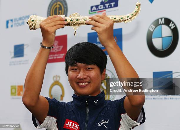 Jeunghun Wang of Korea celebrates with his trophy after the fourth and final round of the Trophee Hassan II at Royal Golf Dar Es Salam on May 8, 2016...