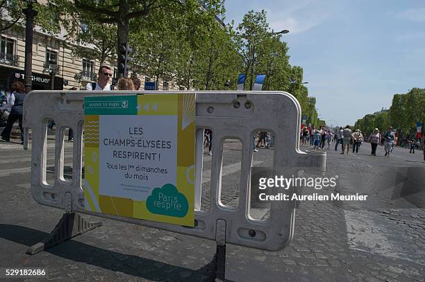 Sign says ' The Champs-Elysee are breathnig' on the Champs-Elysee during the first 'No Car Day' on May 08, 2016 in Paris, France. The Champs-Elysee...