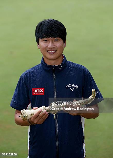 Jeunghun Wang of Korea poses with the dagger trophy after winning the Trophee Hassan II at Royal Golf Dar Es Salam on May 8, 2016 in Rabat, Morocco.