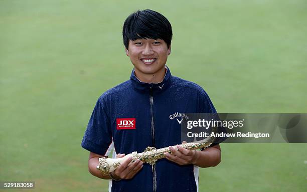 Jeunghun Wang of Korea poses with the dagger trophy after winning the Trophee Hassan II at Royal Golf Dar Es Salam on May 8, 2016 in Rabat, Morocco.