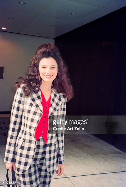 Fran Drescher wearing a checked suit; circa 1990; New York.