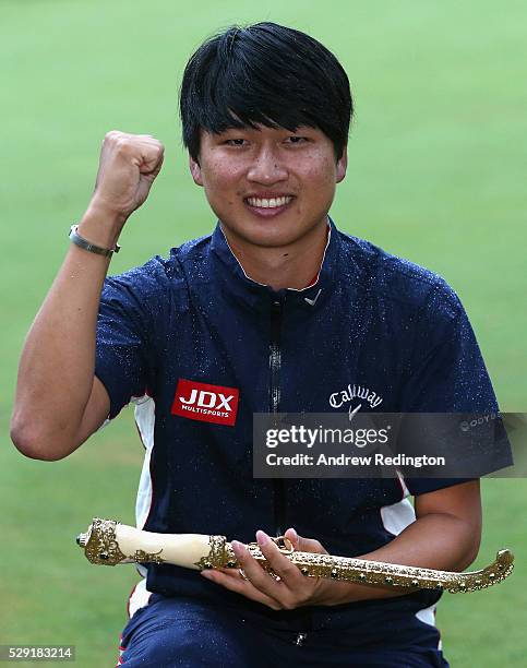 Jeunghun Wang of Korea poses with the dagger trophy after winning the Trophee Hassan II at Royal Golf Dar Es Salam on May 8, 2016 in Rabat, Morocco.