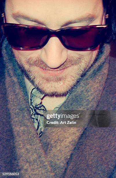 Bono of U2 close-up with sunglasses; circa 1990; New York.