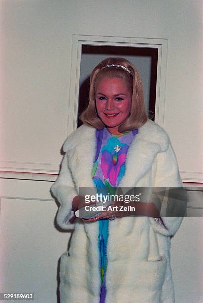 Sandra Dee wearing a white fur coat; circa 1980; New York.