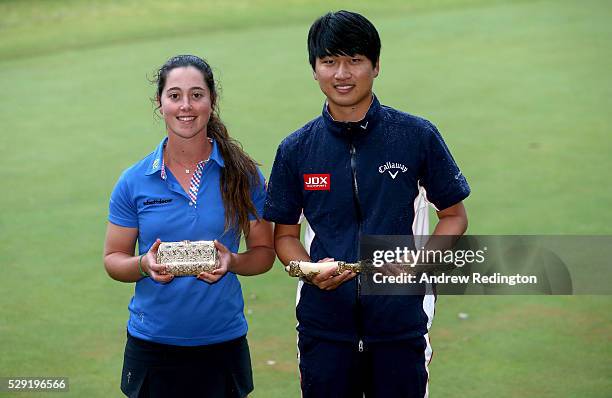 Nuria Iturrios of Spain, winner of the 2016 Lalla Meryem Cup, and Jeunghun Wang of Korea pose with their trophies at the Trophee Hassan II at Royal...