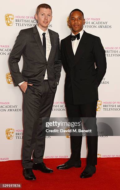 Presenters Professor Green and Reggie Yates pose in the winners room at the House Of Fraser British Academy Television Awards 2016 at the Royal...