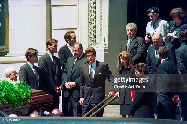 Funeral of Jacqueline Kennedy Onassis, 1994. Caroline Kennedy, John Kennedy, Jr., , Maurice Tempelson, partner , is behind Caroline; New York.