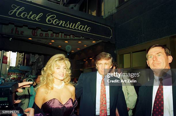 Donald Trump wih Marla Maples outside the Consulate; circa 1980; New York.