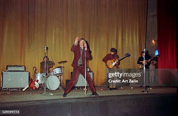 Mick Jagger of The Rolling Stones, in performance at the Academy of Music, 1964; New York.