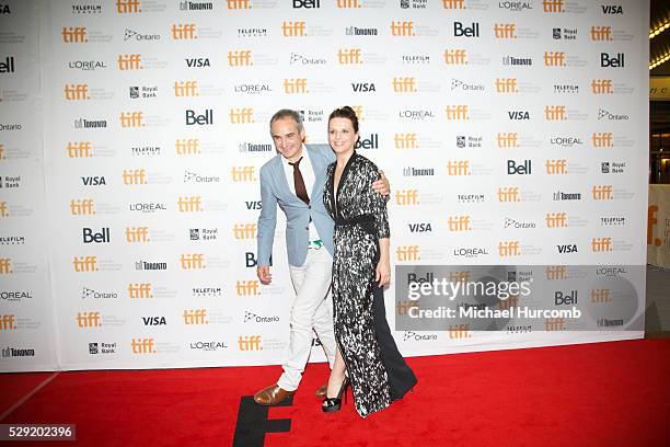Driector Olivier Assayas and actress Juliette Binoche attend the Clouds of Sils Maria premiere at the 2014 Toronto International Film Festival