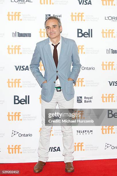 Driector Olivier Assayas attends the Clouds of Sils Maria premiere at the 2014 Toronto International Film Festival