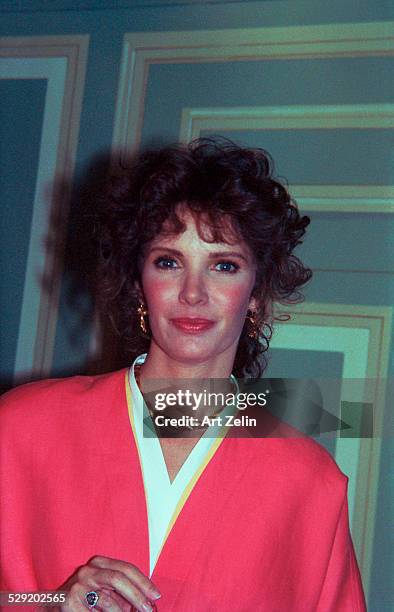 Jaclyn Smith wearing pink; circa 1990; New York.