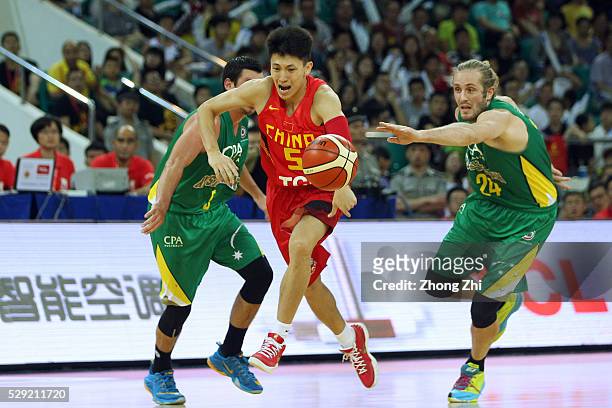 Liu Xiao-Yu of China in action against Jesse Wagstaff of the NBL All Australian Team during Internationl Basketball Challenge match between the...
