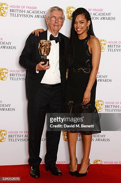 Sir Tom Courtenay, winner of Best Supporting Actor for "Unforgotten", and presenter Georgina Campbell pose in the winners room at the House Of Fraser...