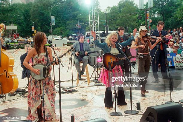 Martie Maguire, Natalie Maines, Emily Robinson, The Dixie Chicks in performance; circa 1990; New York.