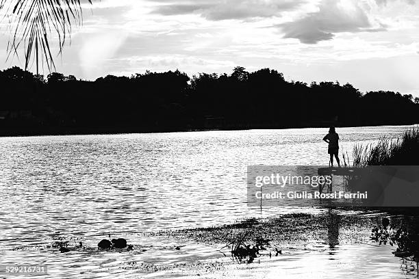 thinking on the river - thailandia stock pictures, royalty-free photos & images