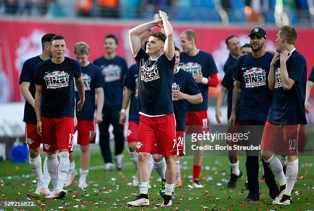 The players of Leipzig celebrate promotion to the first Bundesliga after winning the Second Bundesliga match between RB Leipzig and Karlsruher SC at...