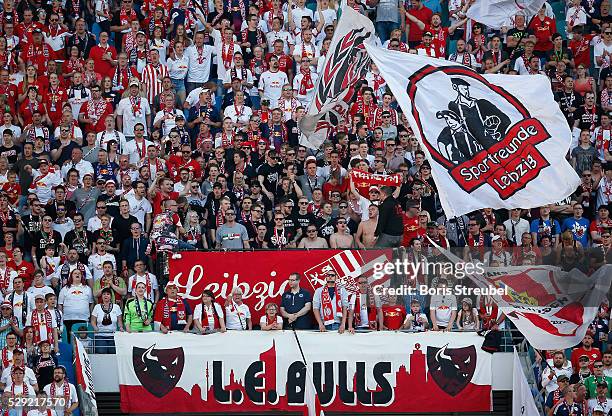 Fans of Leipzig celebrate during the Second Bundesliga match between RB Leipzig and Karlsruher SC at Red Bull Arena on May 08, 2016 in Leipzig,...