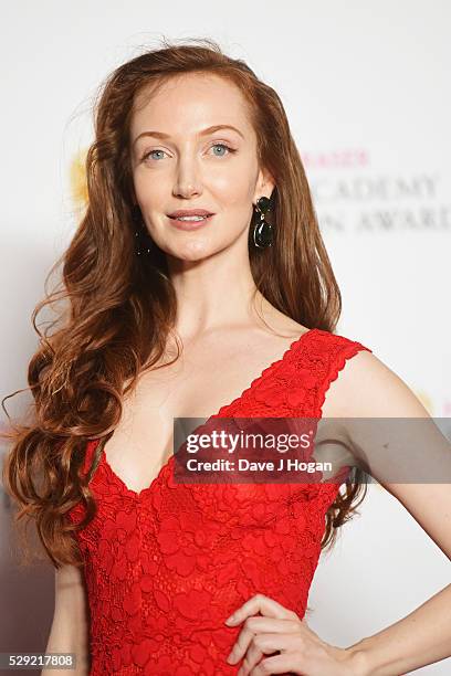 Olivia Grant poses for a photo after presenting an award during the House Of Fraser British Academy Television Awards 2016 at the Royal Festival Hall...