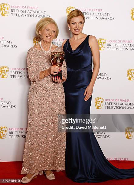 Mary Berry, accepting the Feature award for "The Great British Bake Off", and Katherine Jenkins pose in the winners room at the House Of Fraser...