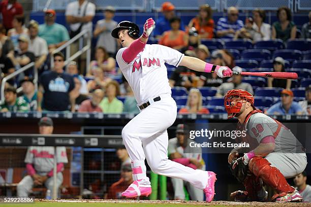 First baseman Chris Johnson of the Miami Marlins hits a home run during the 7th inning of the game between the Philadelphia Phillies and Miami...