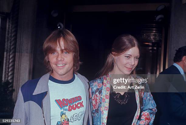 Mark Hamill with his girlfriend at a theater; circa 1970; New York.