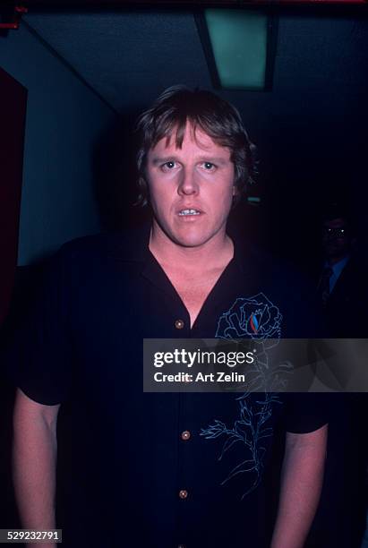 Gary Busey wearing a shirt with a rose; circa 1970; New York.