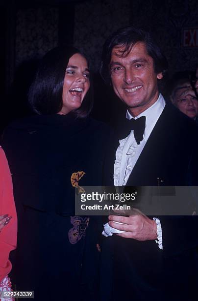 Bob Evans ; with his wife; Ali MacGraw at a formal event; circa 1970; New York.